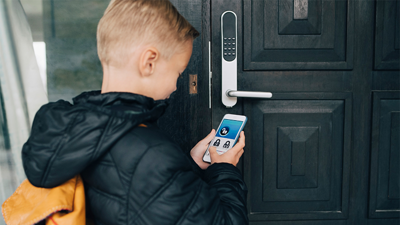 Boy-opening-the-door-with-phone-800x450