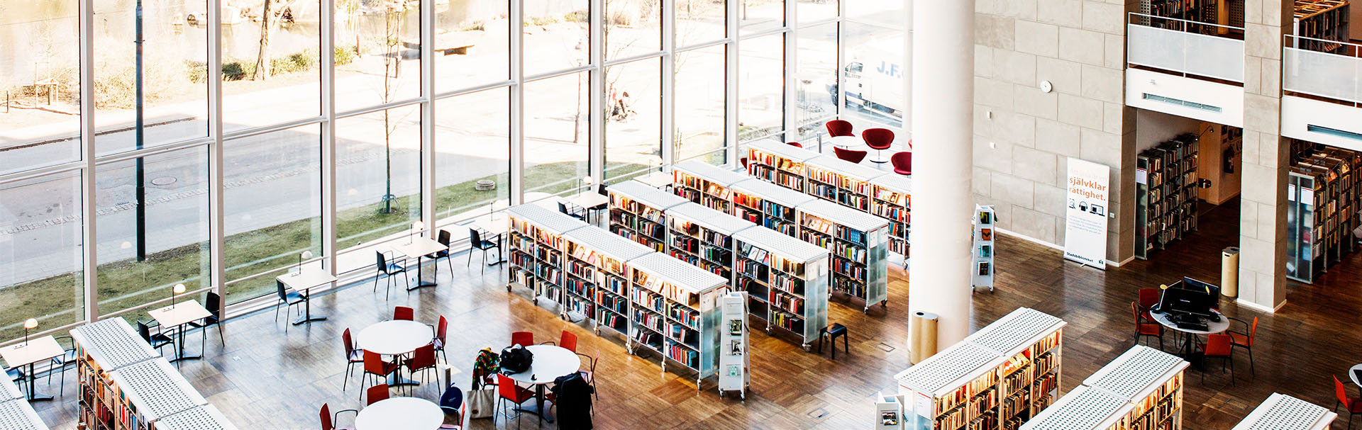 High angle view of library with glass windows-1920x607