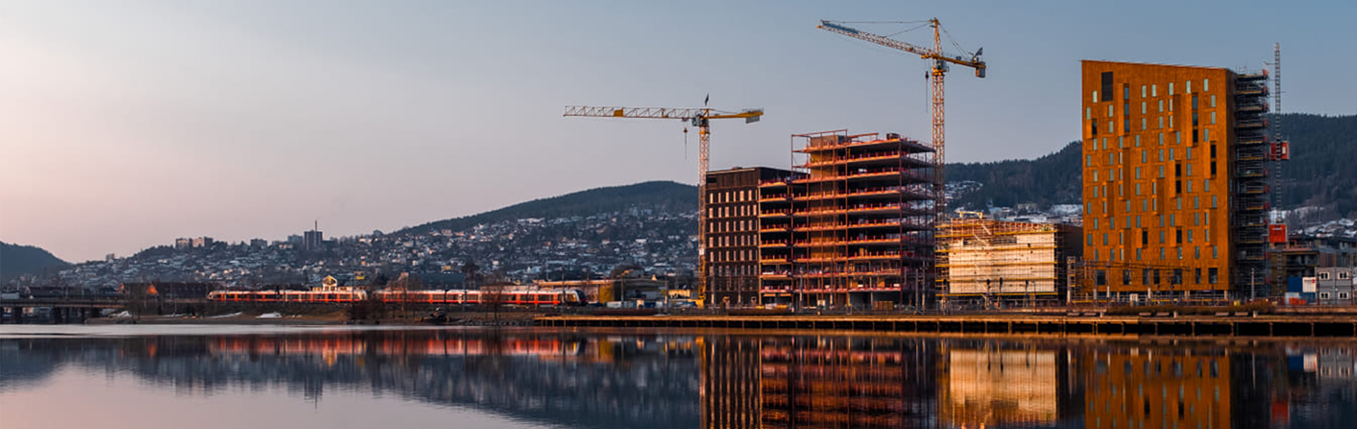 Security-for-all-industries-view-over-lake-and-buildings-1920x607